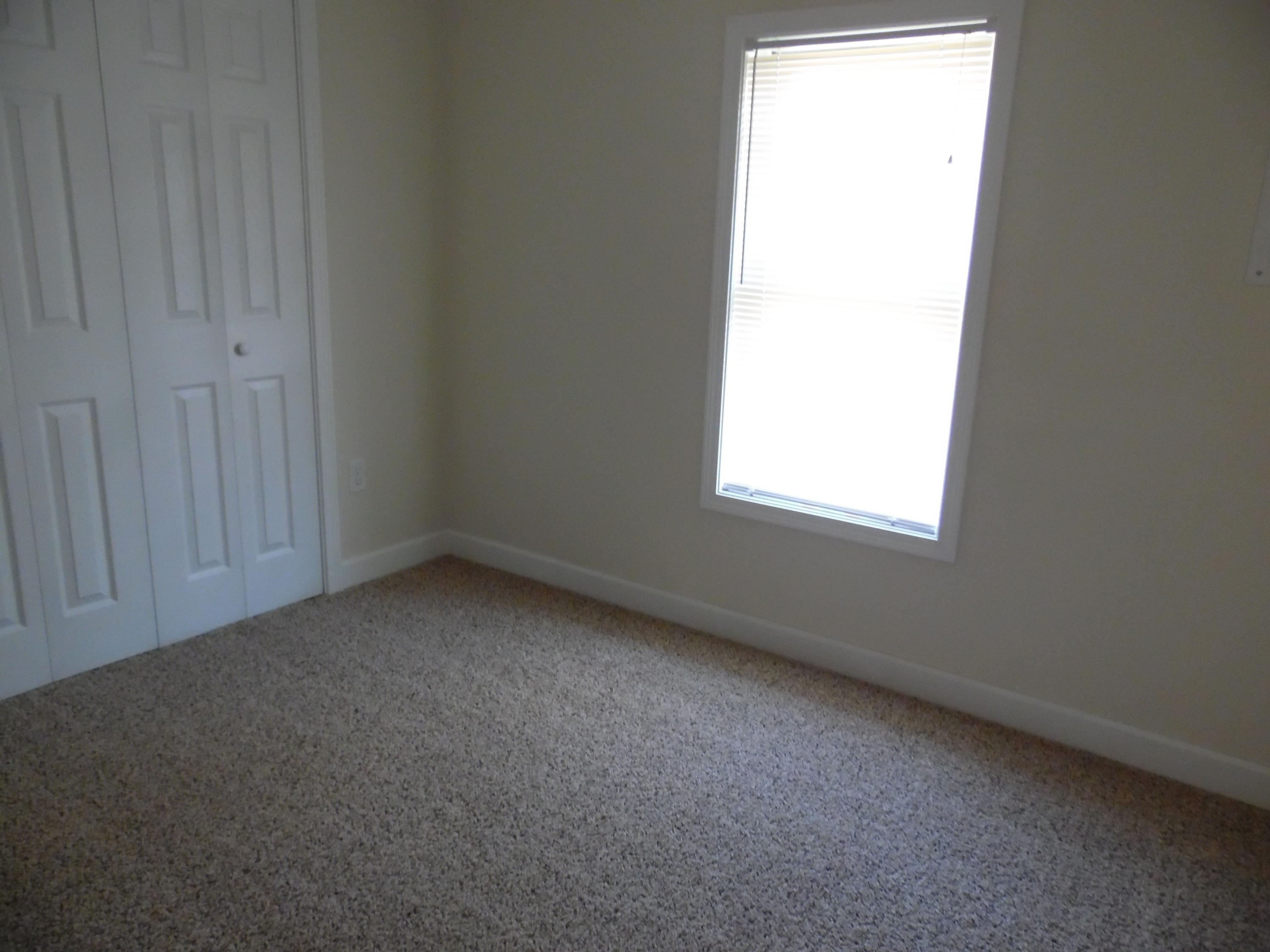 4005 King Lake Road DeFuniak Springs, FL 32433 - Photo 20 of 35 an empty room with a window