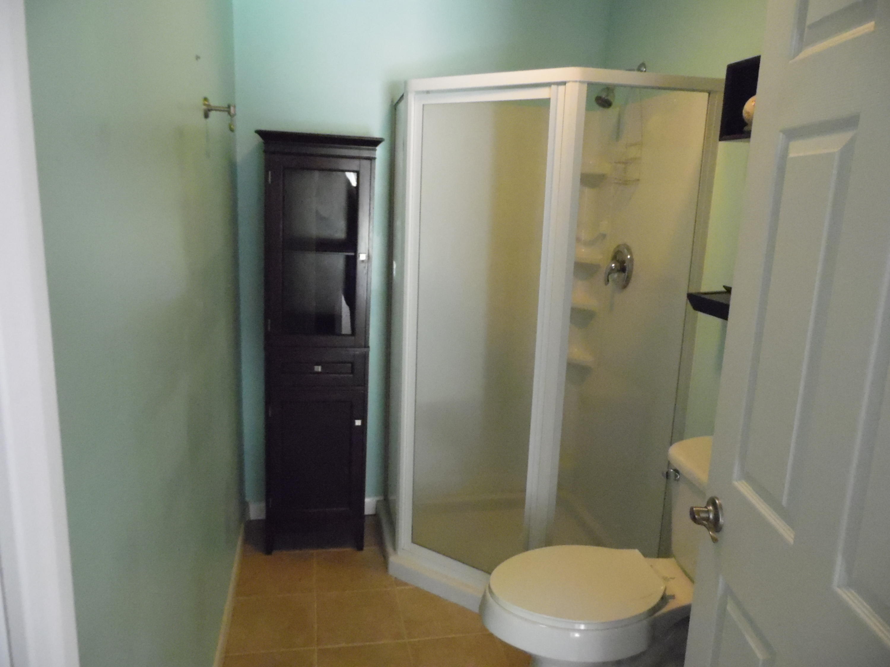 4005 King Lake Road DeFuniak Springs, FL 32433 - Photo 22 of 35 a bathroom with a shower and a toilet