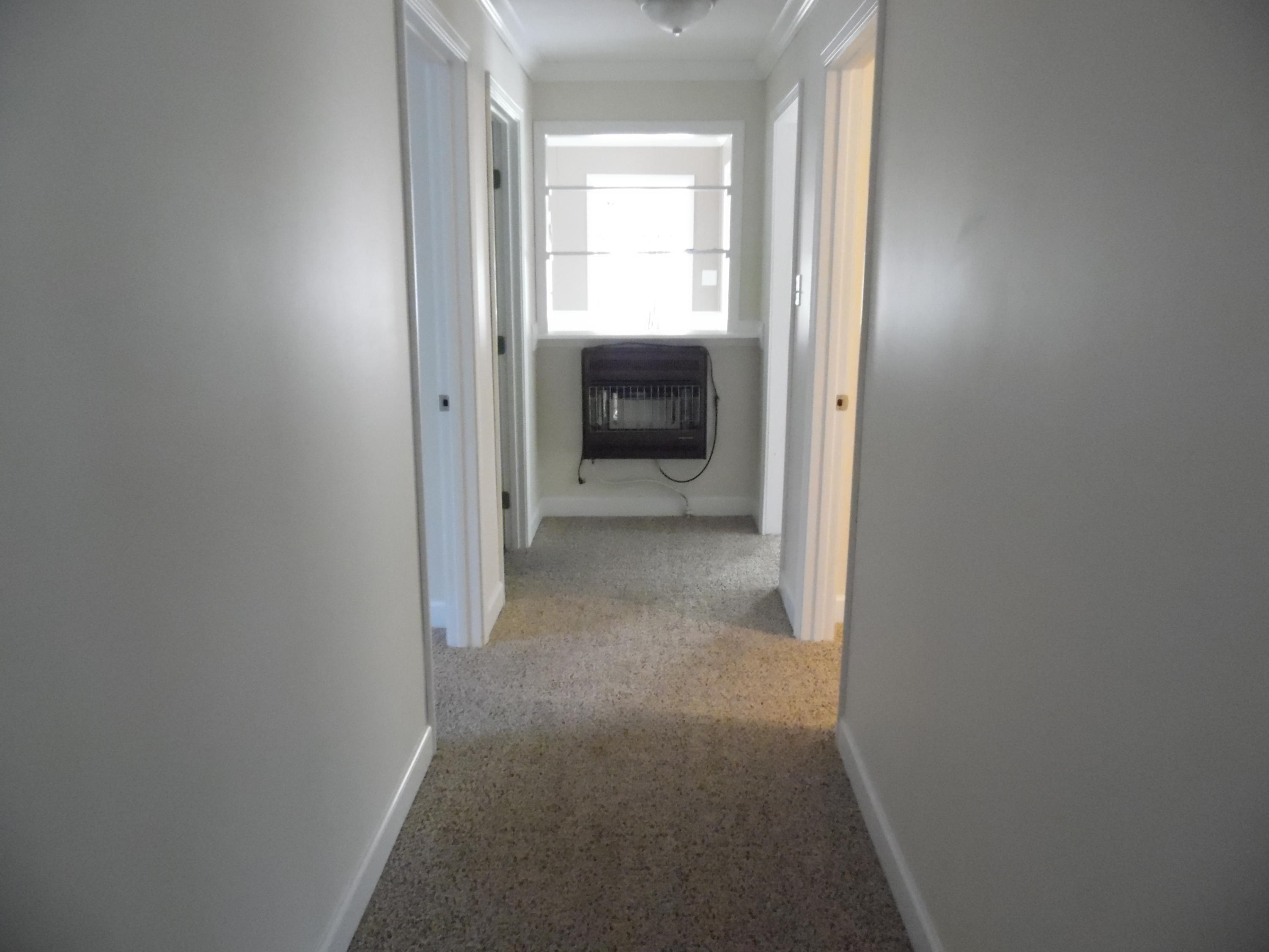 4005 King Lake Road DeFuniak Springs, FL 32433 - Photo 23 of 35 a view of a hallway with a livingroom and a window