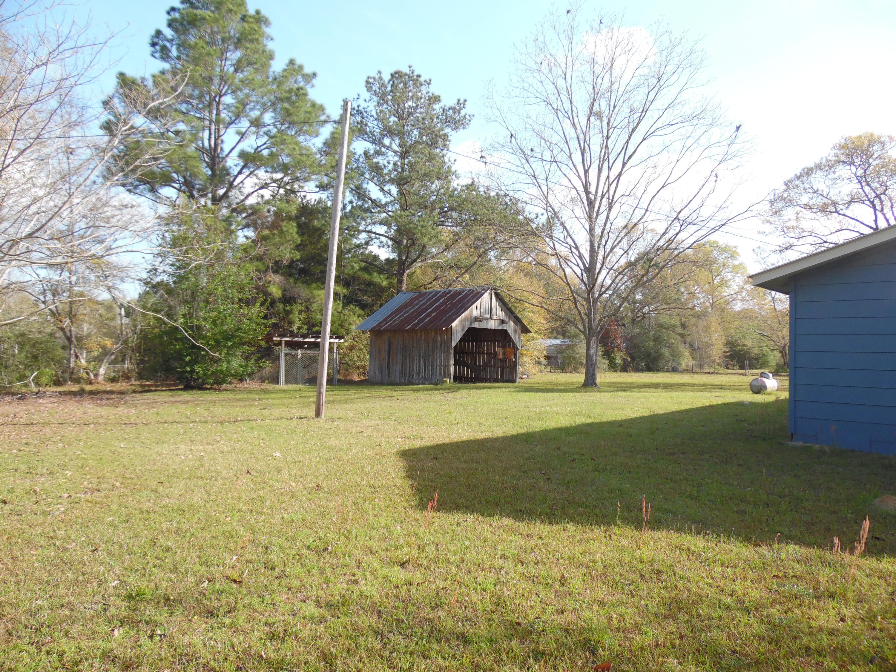 4005 King Lake Road DeFuniak Springs, FL 32433 - Photo 26 of 35 a view of a large trees with wooden fence