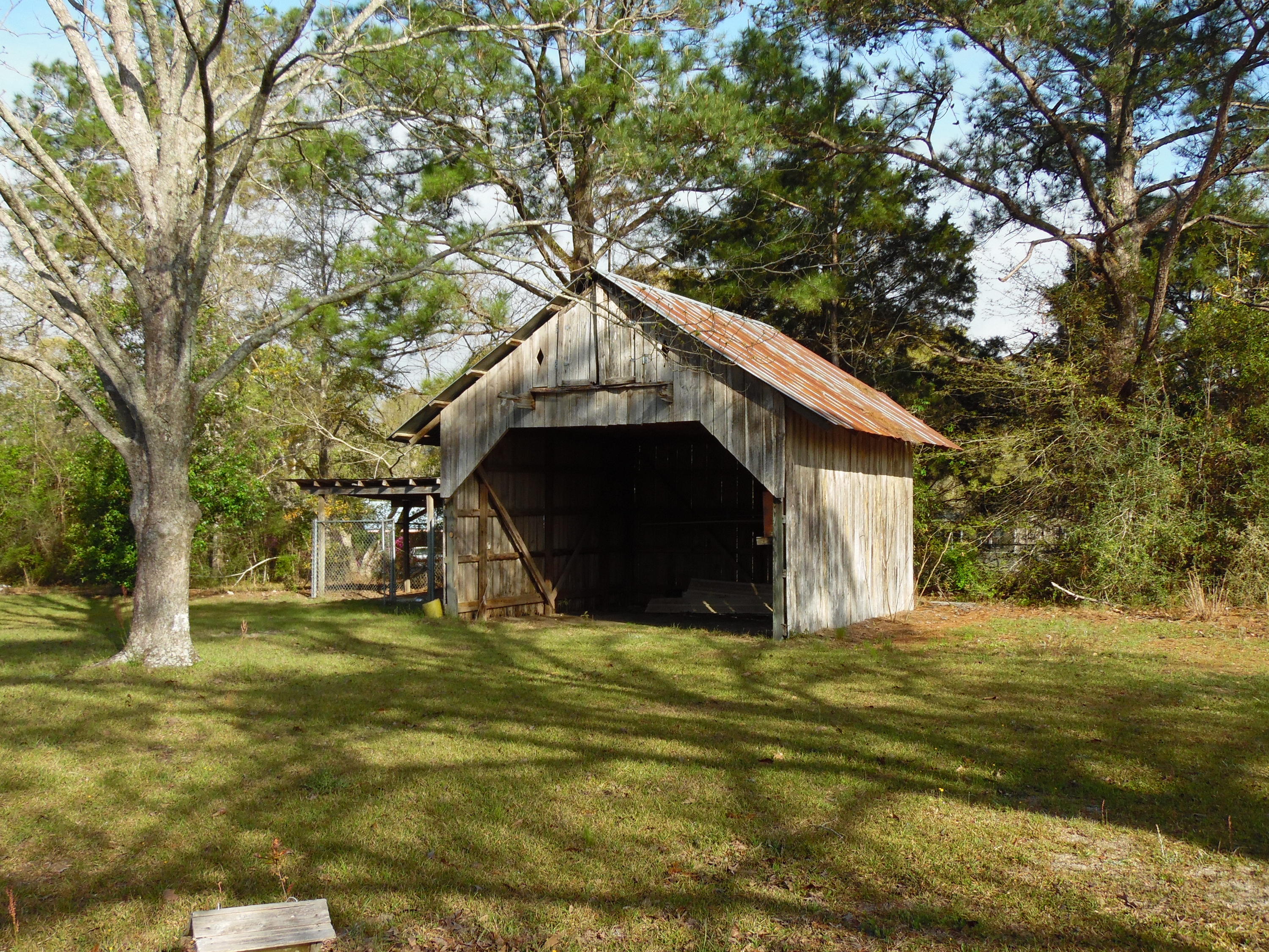 4005 King Lake Road DeFuniak Springs, FL 32433 - Photo 33 of 35 a view of a house with a yard