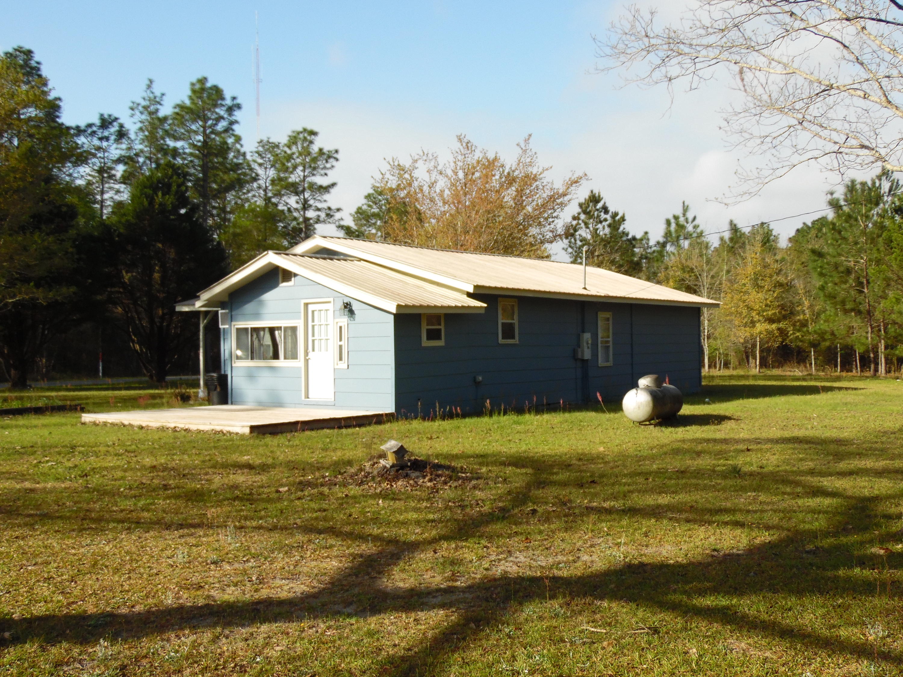 4005 King Lake Road DeFuniak Springs, FL 32433 - Photo 7 of 35 a view of a house with a swimming pool