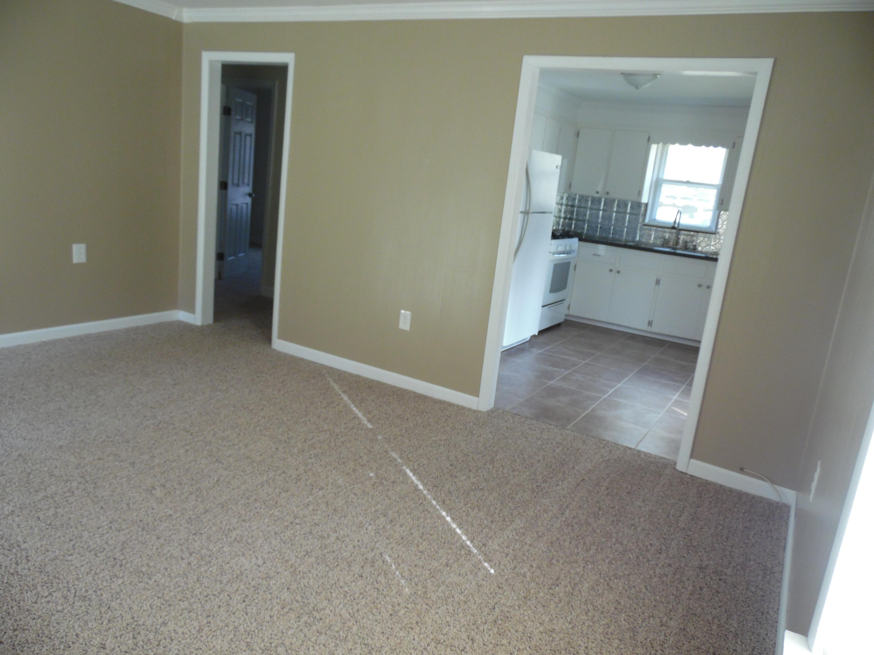 4005 King Lake Road DeFuniak Springs, FL 32433 - Photo 9 of 35 an empty room with mirror and a bathroom