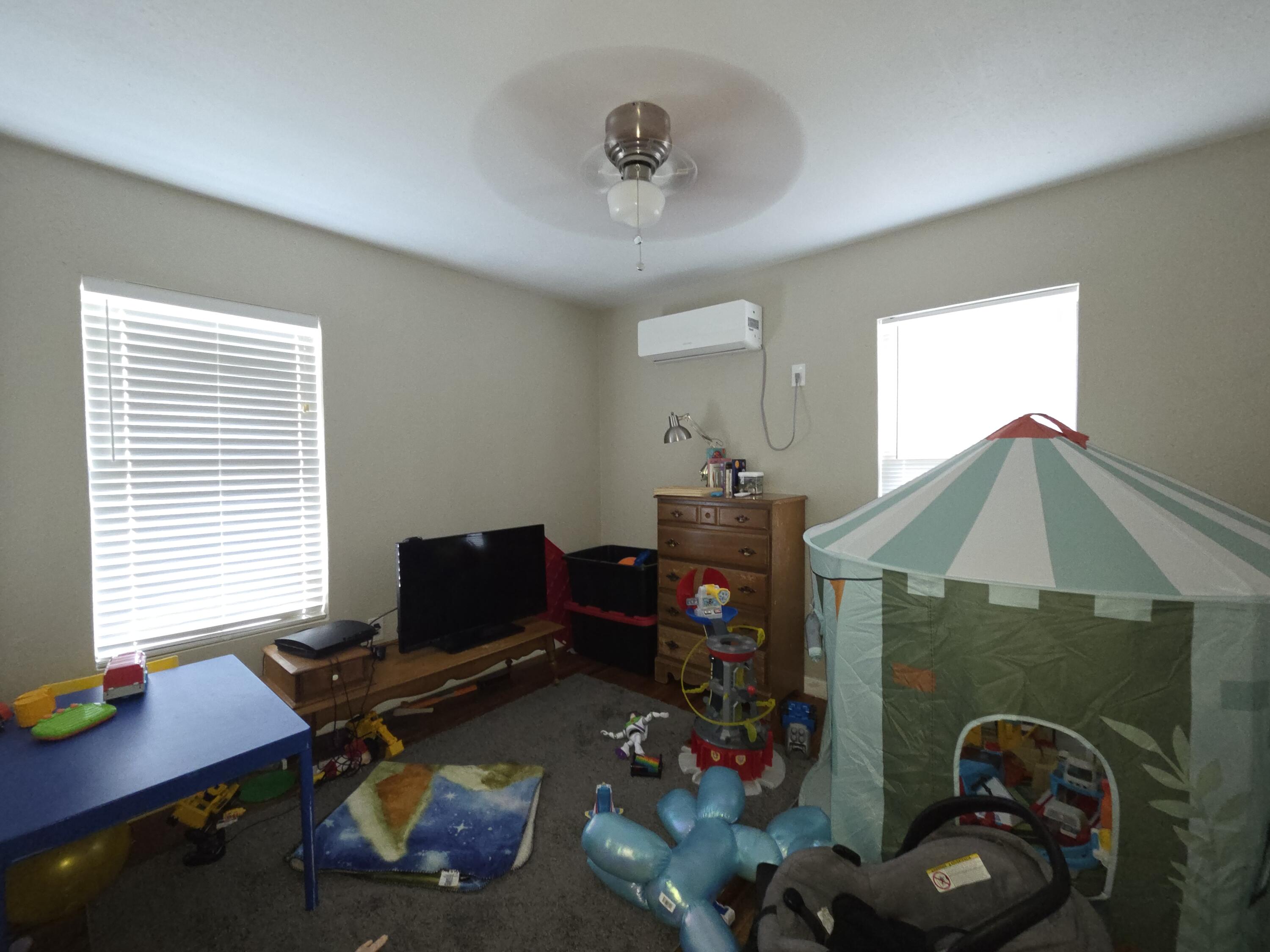 3308 2nd Street Lubbock, TX 79415 - Photo 5 of 6 a workspace with furniture and a window