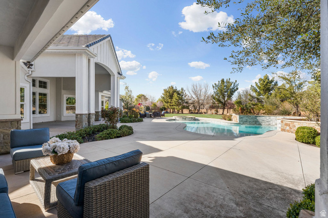 2917 Old Farm Road Washington, UT 84780 - Photo 26 of 105 Swimming pool with a patio and an in-ground hot tub