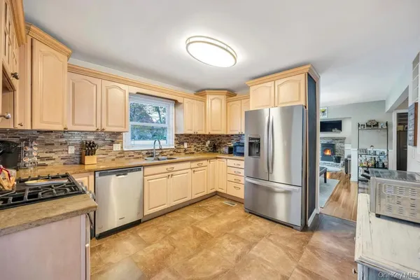 $599,999 | 45 Floradora Drive, Mastic, NY 11950