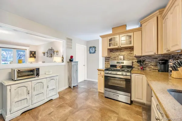 $599,999 | 45 Floradora Drive, Mastic, NY 11950