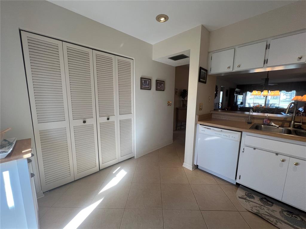 338 Cerromar Way, Unit 4 Venice, FL 34293 - Photo 22 of 41 a view of a kitchen and utility room
