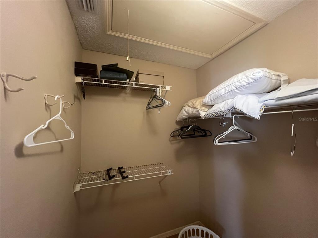 338 Cerromar Way, Unit 4 Venice, FL 34293 - Photo 28 of 41 a view of a room with racks on the wall