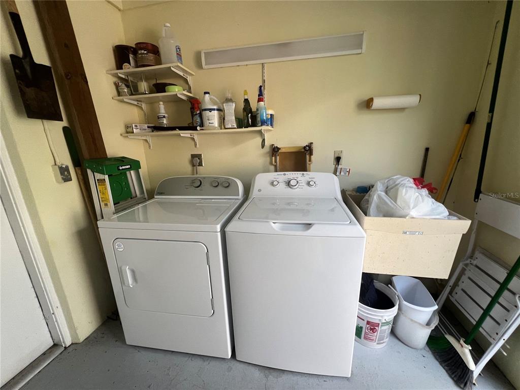 338 Cerromar Way, Unit 4 Venice, FL 34293 - Photo 41 of 41 a utility room with dryer and washer