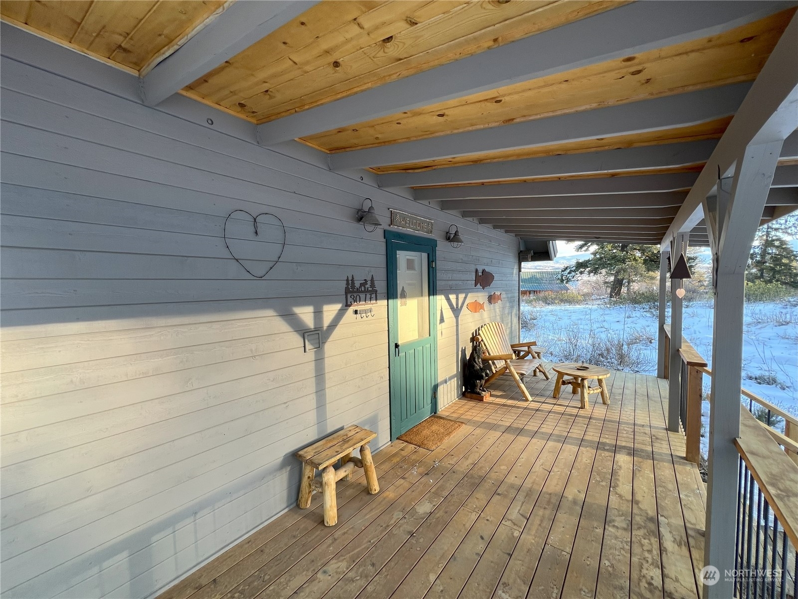 30 Left Fork Wolf Creek Road Winthrop, WA 98862 - Photo 11 of 40 a view of a patio with wooden floor