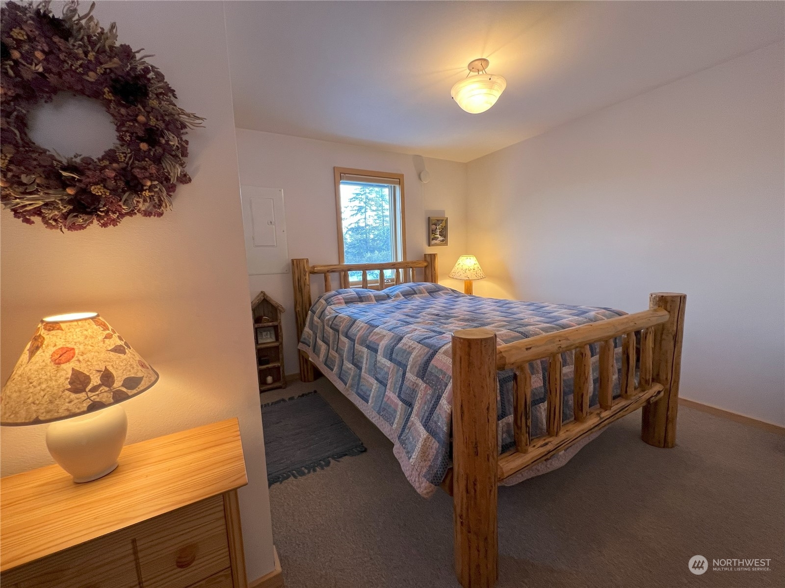 30 Left Fork Wolf Creek Road Winthrop, WA 98862 - Photo 14 of 40 a bedroom with a bed and a window