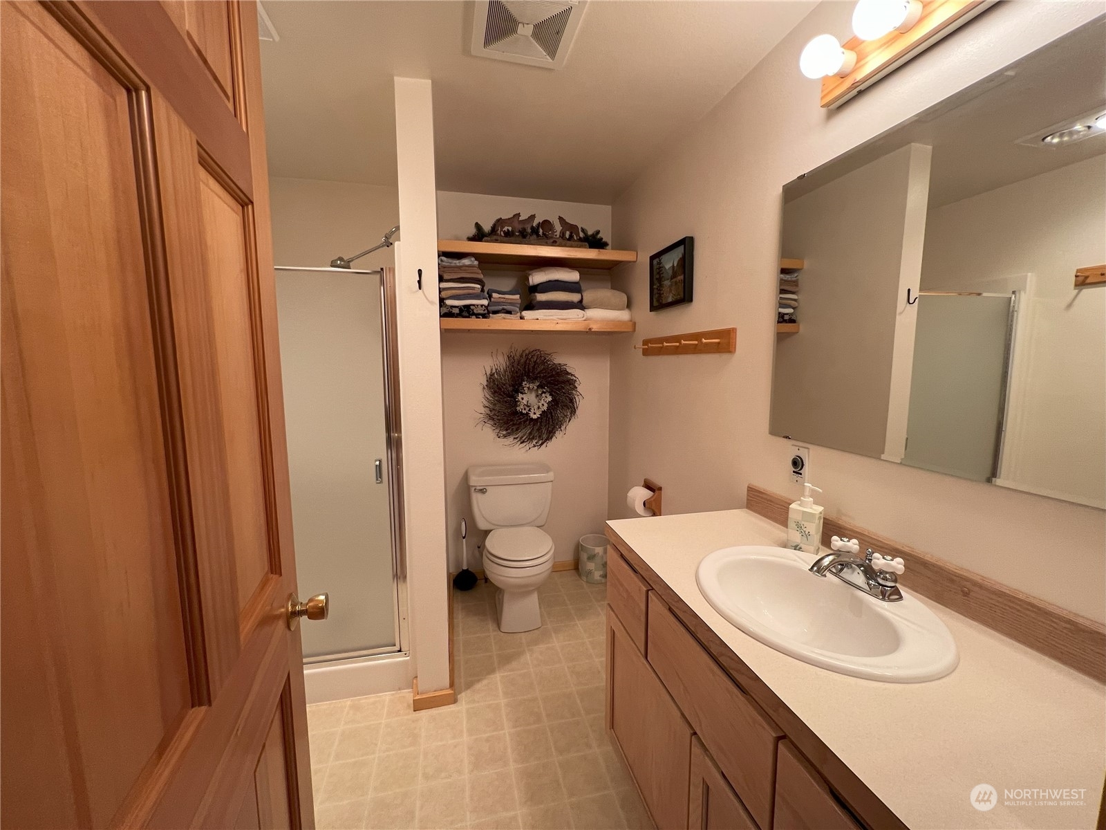 30 Left Fork Wolf Creek Road Winthrop, WA 98862 - Photo 15 of 40 a bathroom with a sink toilet and shower