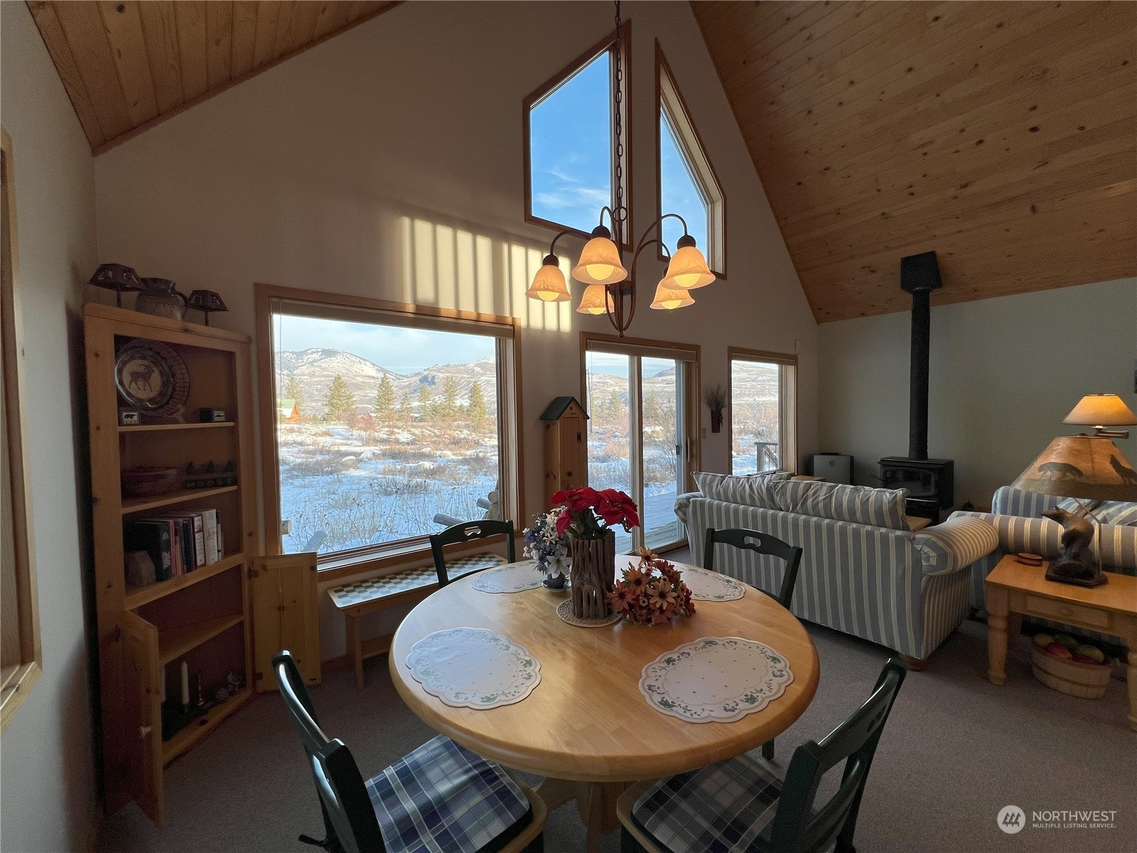 30 Left Fork Wolf Creek Road Winthrop, WA 98862 - Photo 19 of 40 a view of a dining room with furniture window and outside view