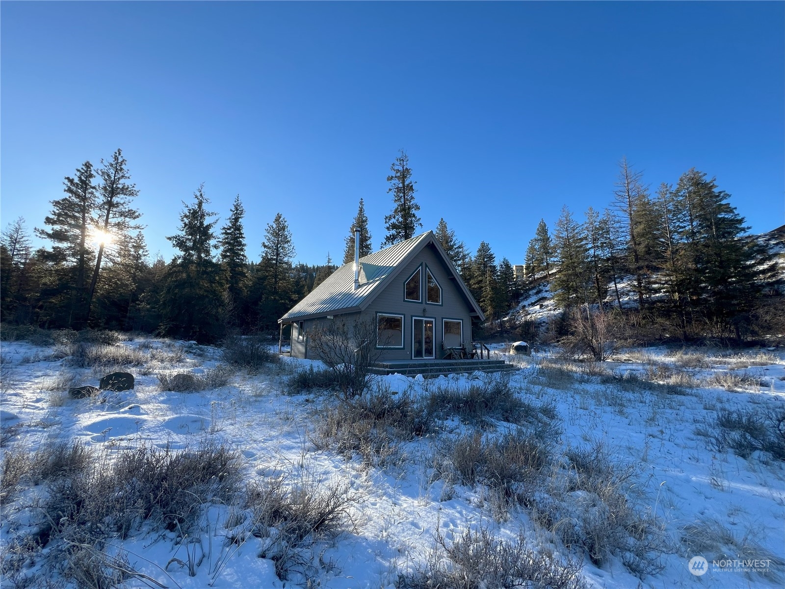 30 Left Fork Wolf Creek Road Winthrop, WA 98862 - Photo 30 of 40 a view of a house with a yard