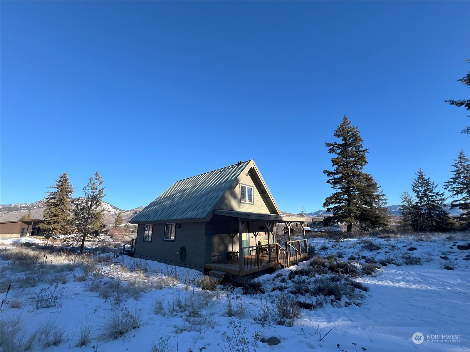 30 Left Fork Wolf Creek Road Winthrop, WA 98862 - Photo 31 of 40 a view of a house with a yard