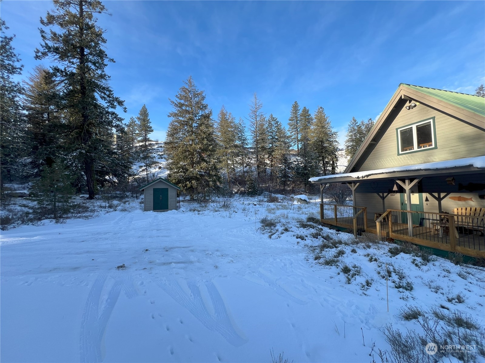 30 Left Fork Wolf Creek Road Winthrop, WA 98862 - Photo 36 of 40 a front view of a house with garden