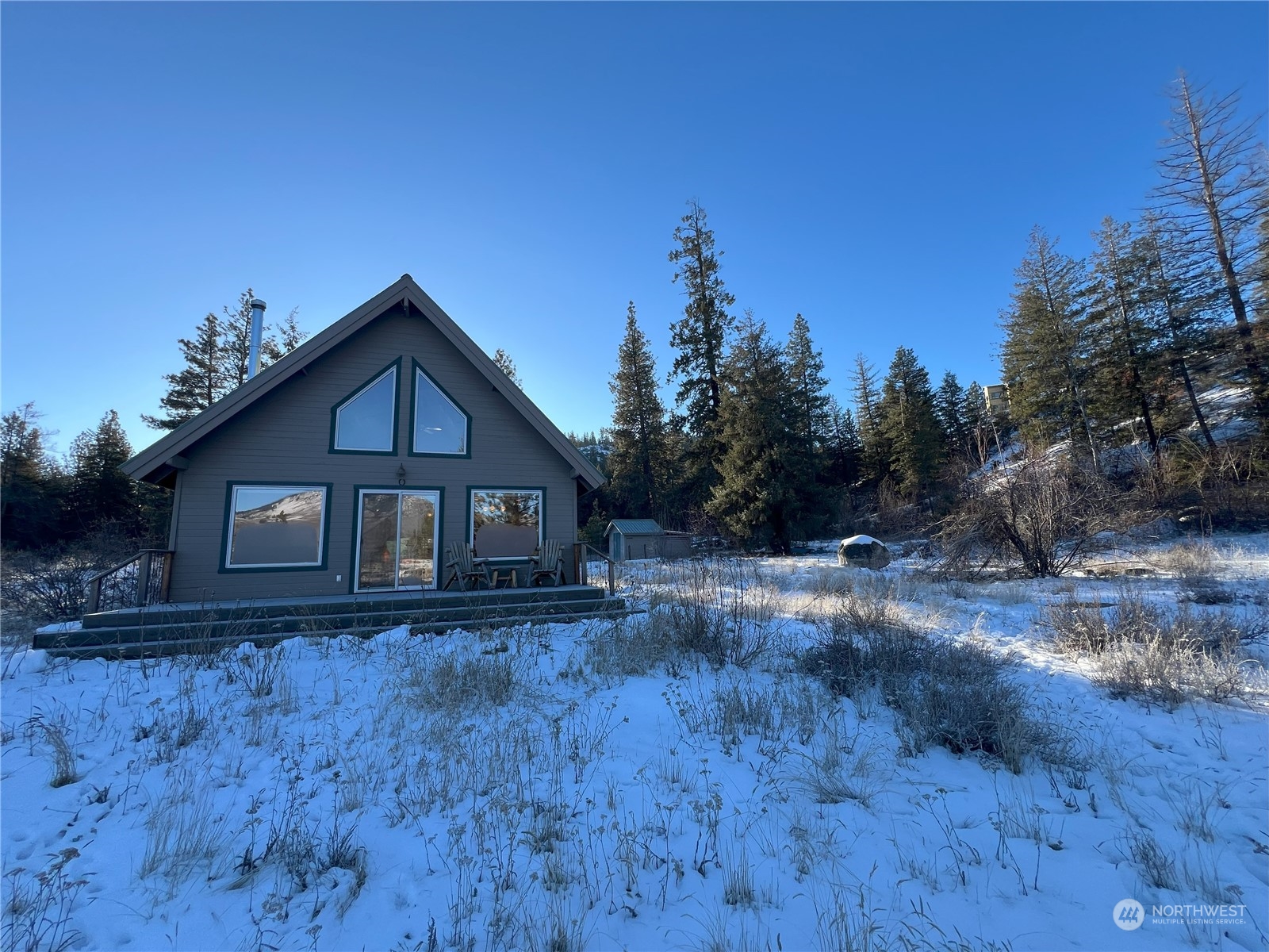 30 Left Fork Wolf Creek Road Winthrop, WA 98862 - Photo 9 of 40 a front view of a house with a yard