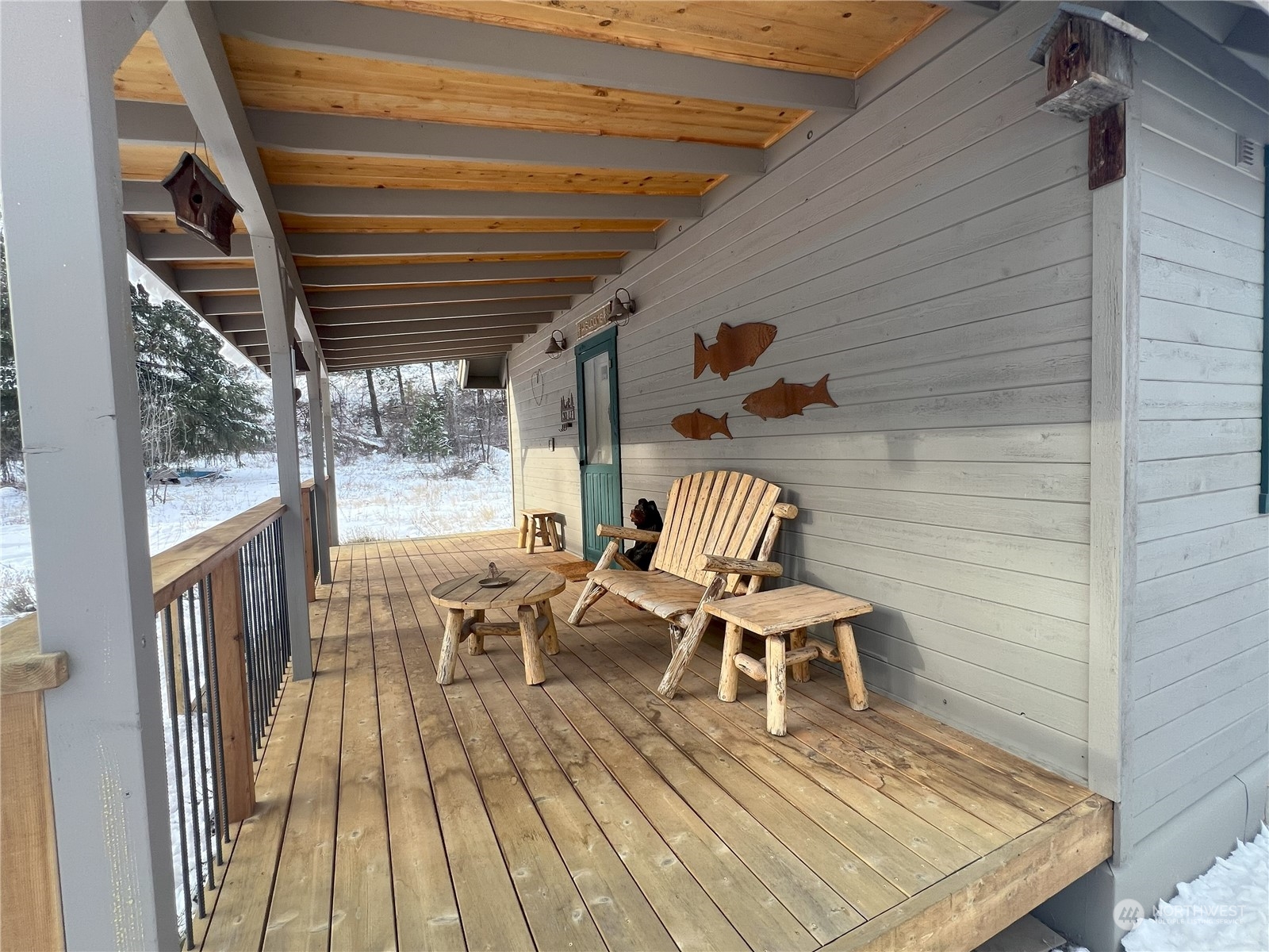30 Left Fork Wolf Creek Road Winthrop, WA 98862 - Photo 10 of 40 a view of a chairs and table on the deck