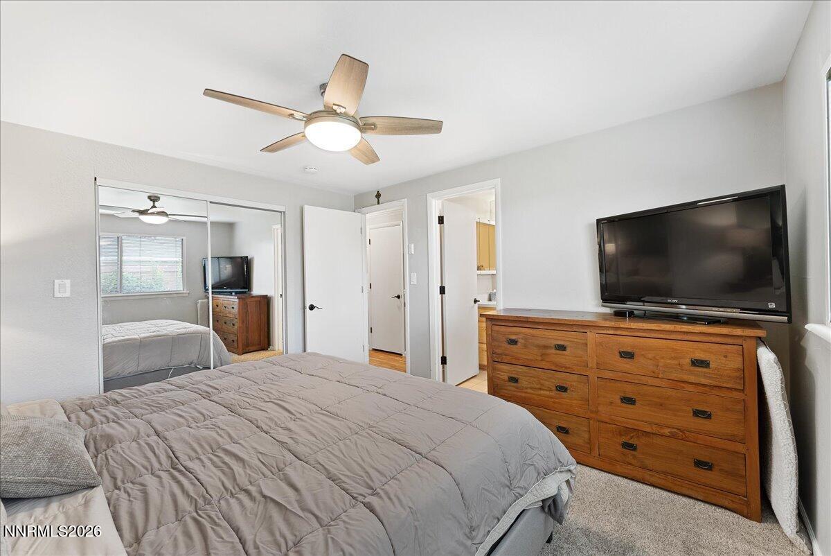 2205 Carlin Street Reno, NV 89503 - Photo 20 of 51 a bedroom with a bed and a flat screen tv