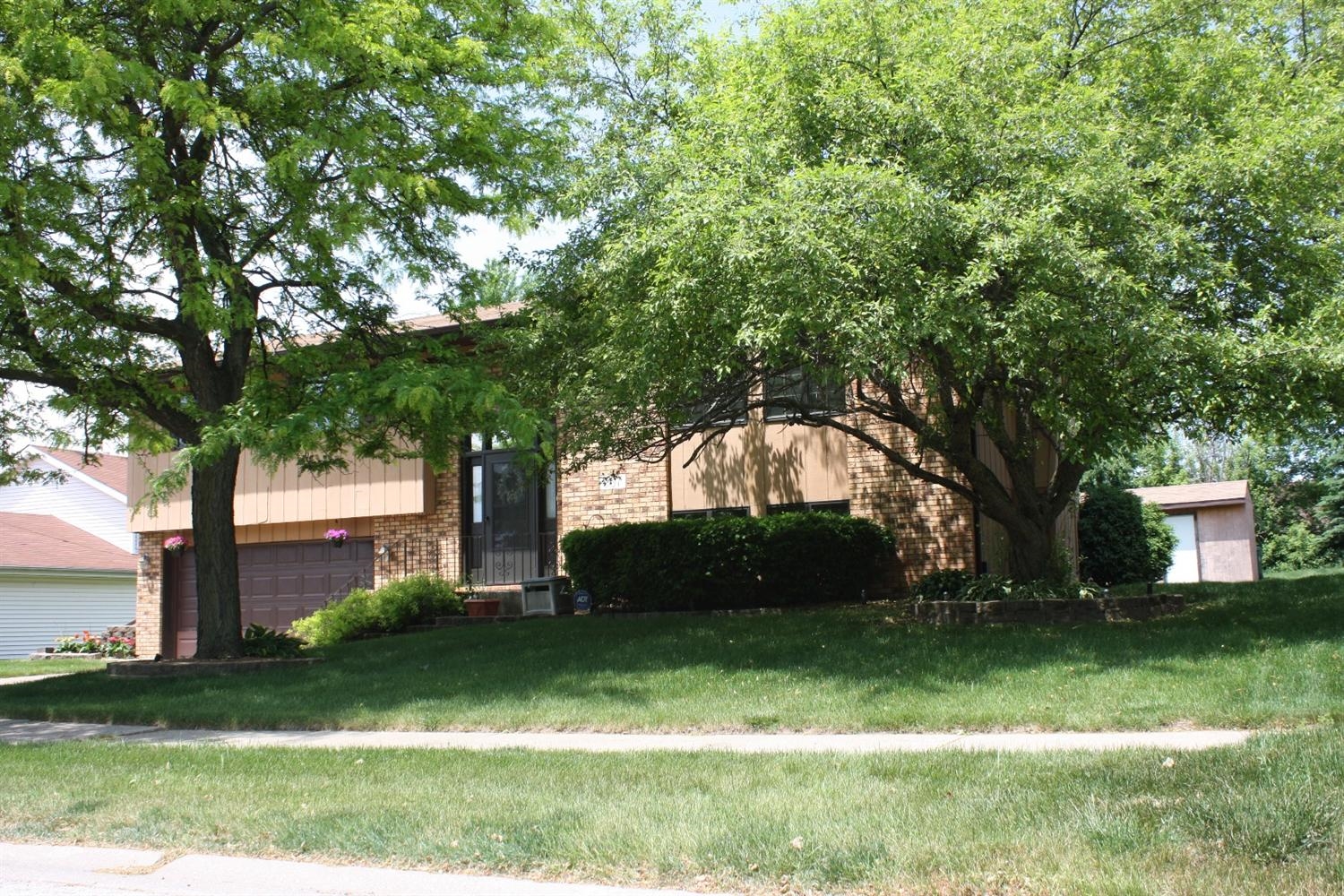 907 Old Beach Road Dyer, IN 46311 - Photo 4 of 10 a front view of a house with a garden