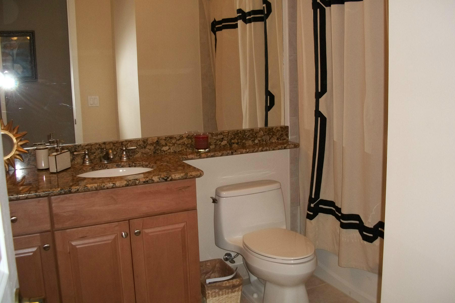 822 Northwest 82nd Place Boca Raton, FL 33487 - Photo 14 of 22 a bathroom with a sink toilet and shower