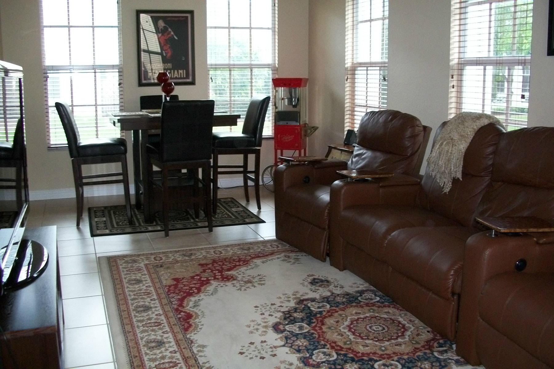 822 Northwest 82nd Place Boca Raton, FL 33487 - Photo 3 of 22 a living room with furniture and a large window