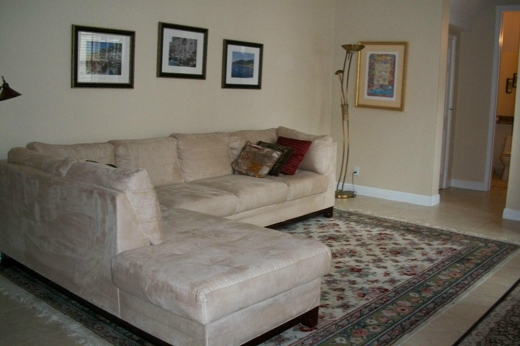 822 Northwest 82nd Place Boca Raton, FL 33487 - Photo 5 of 22 a living room with furniture and a rug