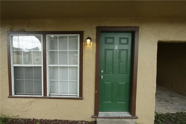 a front view of a house with a window