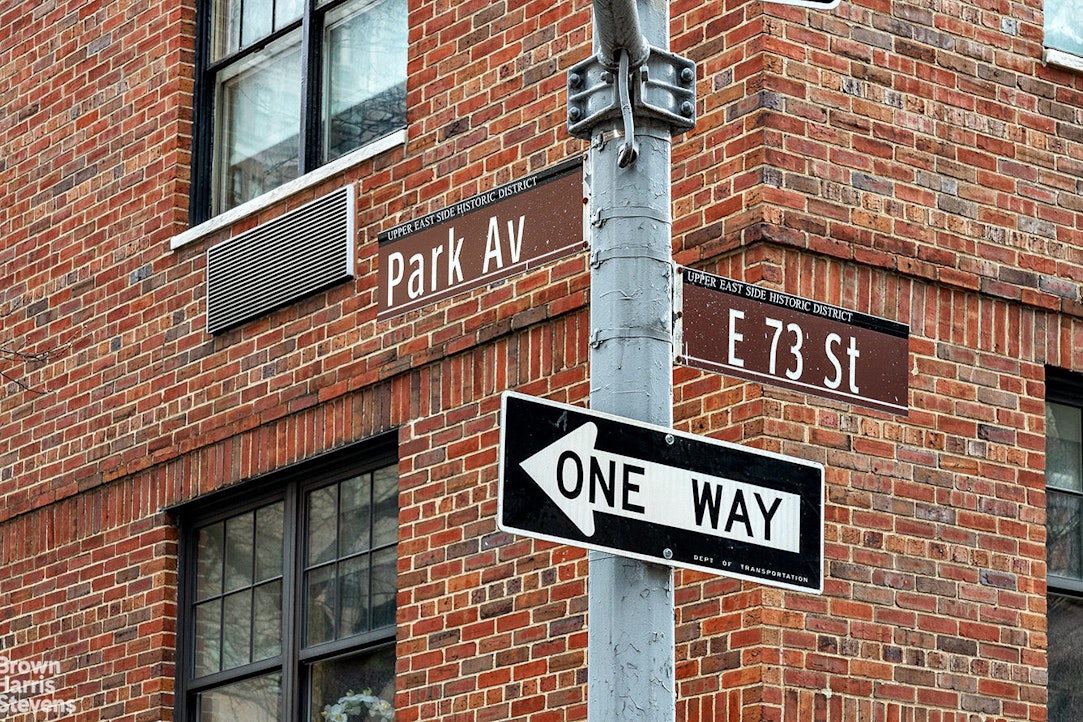 785 Park Avenue, Unit 1D Manhattan, NY 10003 - Photo 8 of 10 a street sign on a brick wall