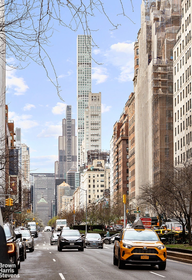 785 Park Avenue, Unit 1D Manhattan, NY 10003 - Photo 9 of 10 a car parked in front of a city
