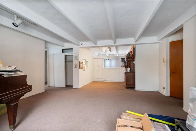 a view of a livingroom with furniture