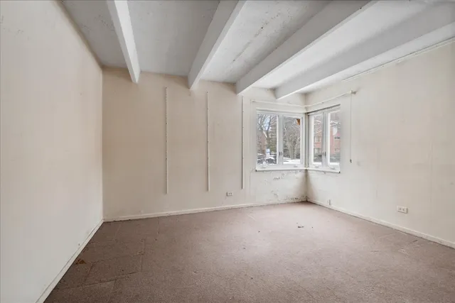 an empty room with windows