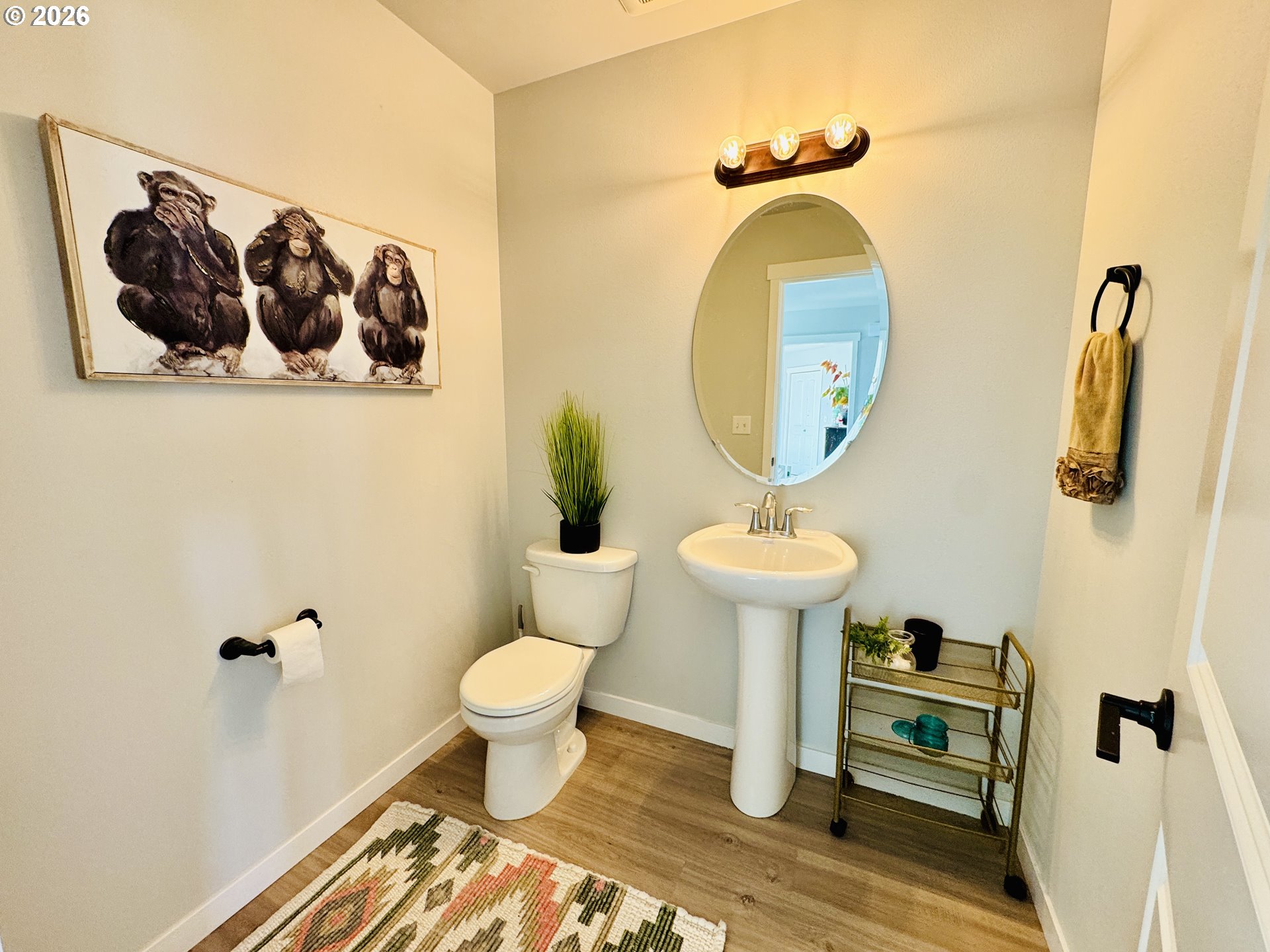 74969 Washington Lane Irrigon, OR 97844 - Photo 33 of 33 a bathroom with a toilet sink and mirror