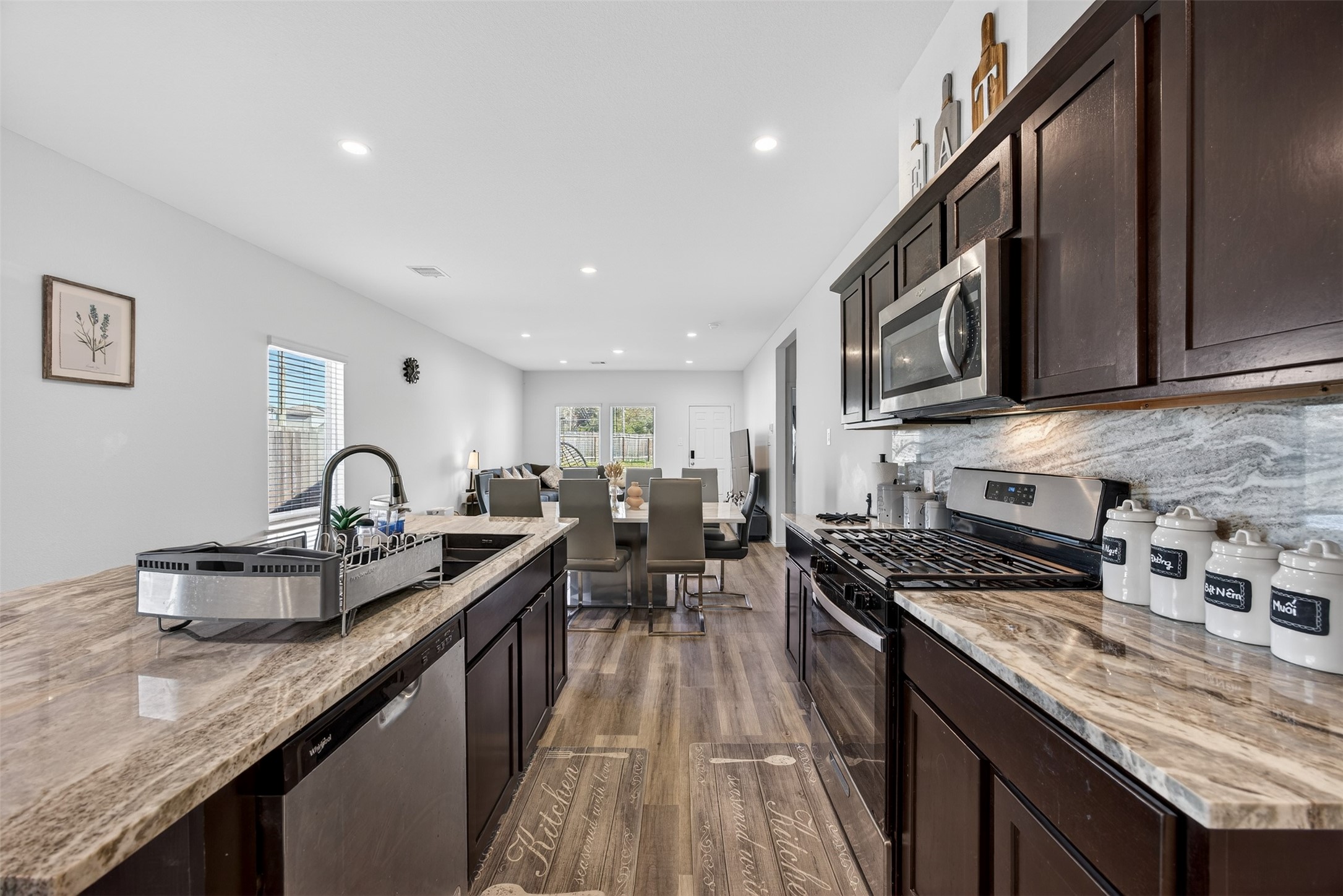 1702 Legacy Hills Drive Houston, TX 77067 - Photo 13 of 43 a kitchen with granite countertop lots of counter top space