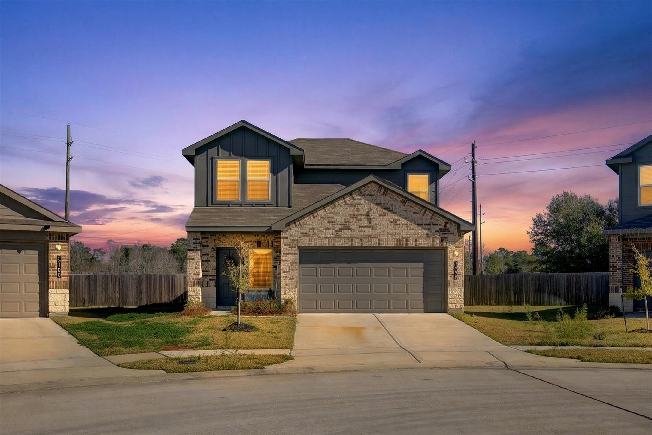 1702 Legacy Hills Drive Houston, TX 77067 - Photo 2 of 43 a front view of a house with a yard and garage