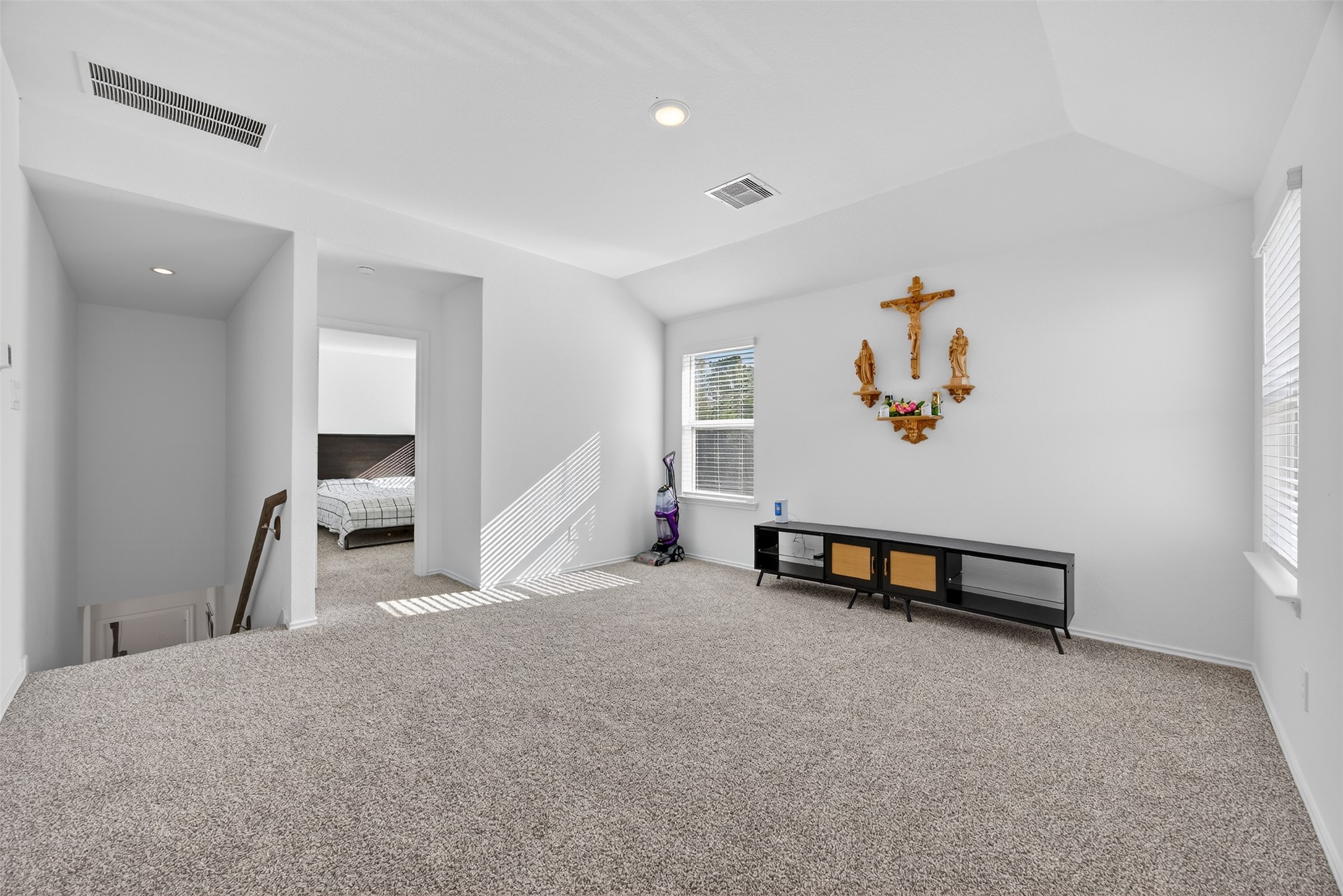 1702 Legacy Hills Drive Houston, TX 77067 - Photo 27 of 43 a bedroom with furniture and window