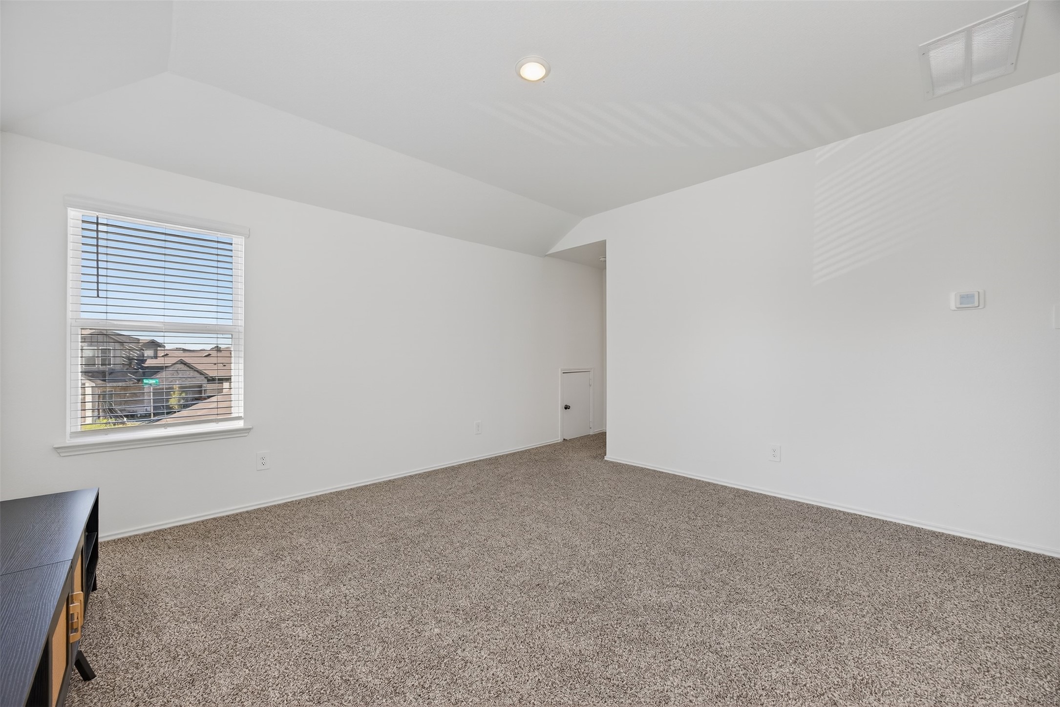 1702 Legacy Hills Drive Houston, TX 77067 - Photo 28 of 43 a view of an empty room with a window