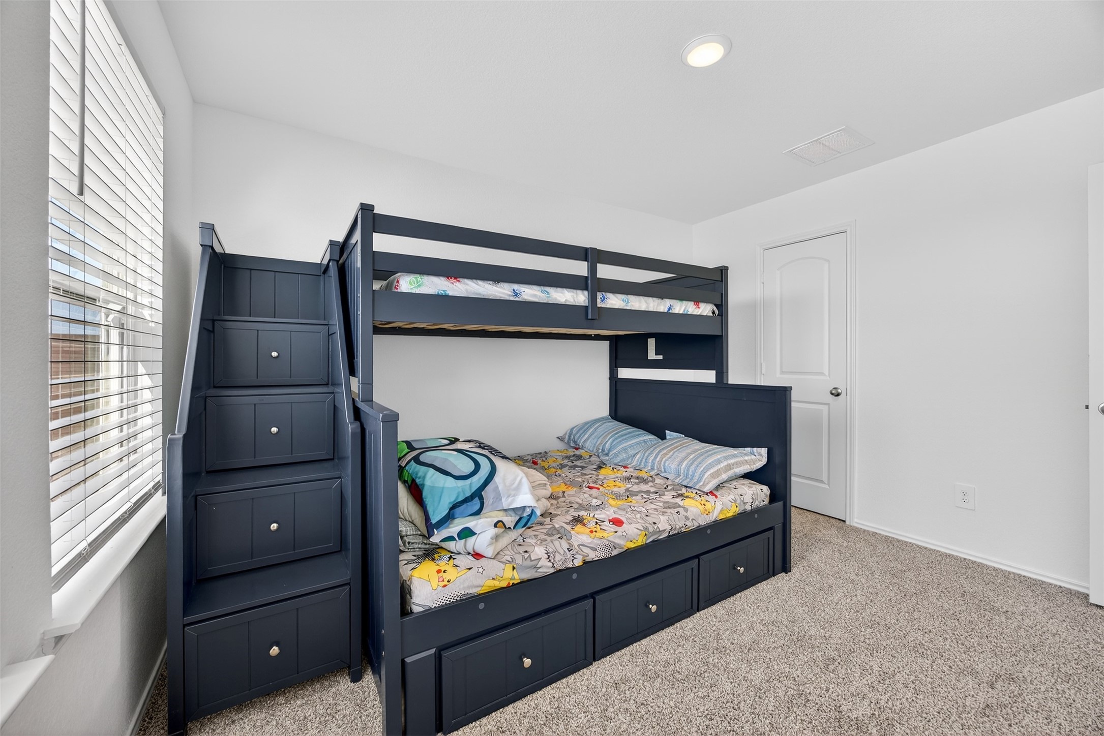 1702 Legacy Hills Drive Houston, TX 77067 - Photo 32 of 43 a bed room with a bed and a television