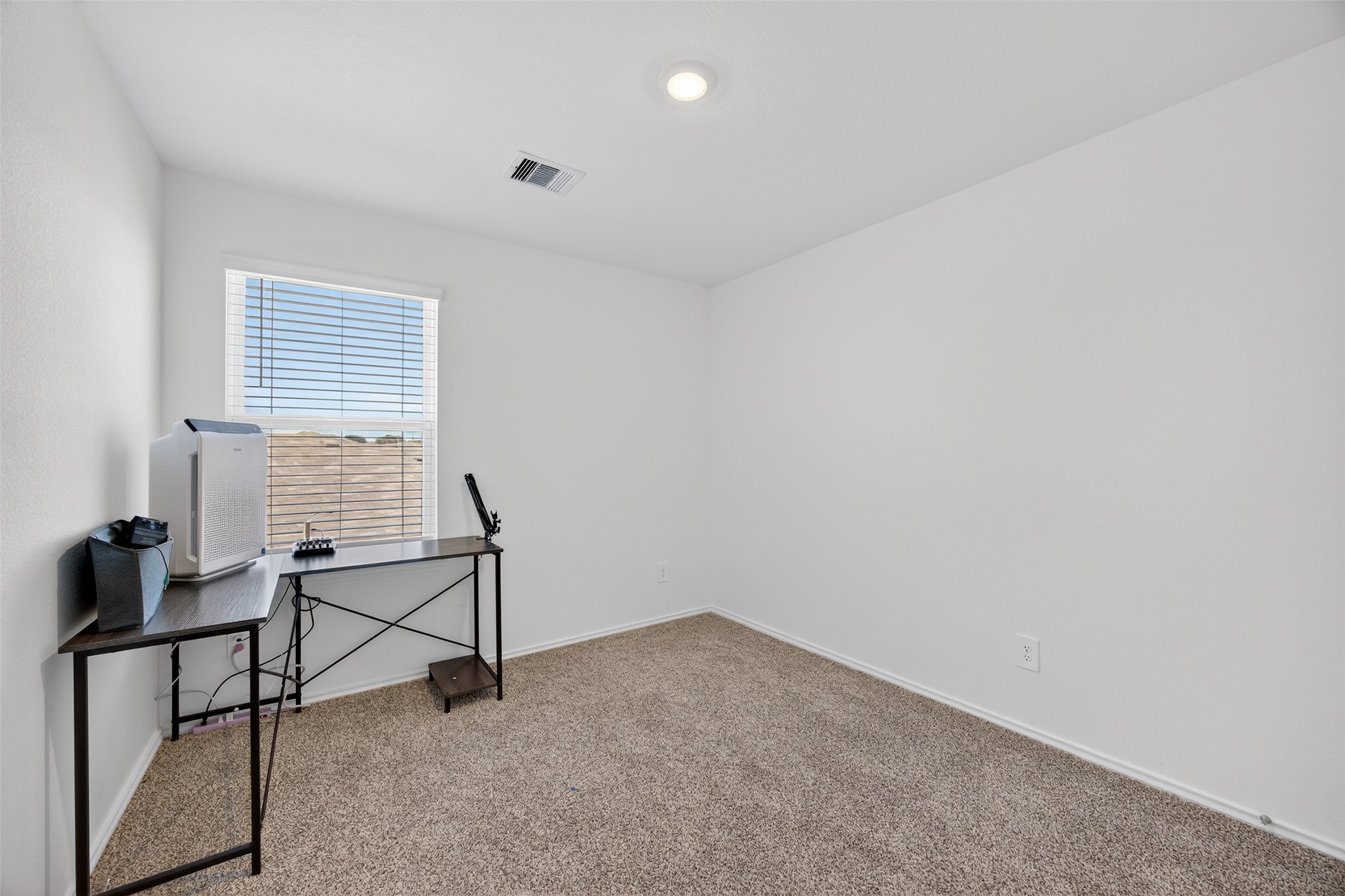 1702 Legacy Hills Drive Houston, TX 77067 - Photo 34 of 43 a view of an empty room and window