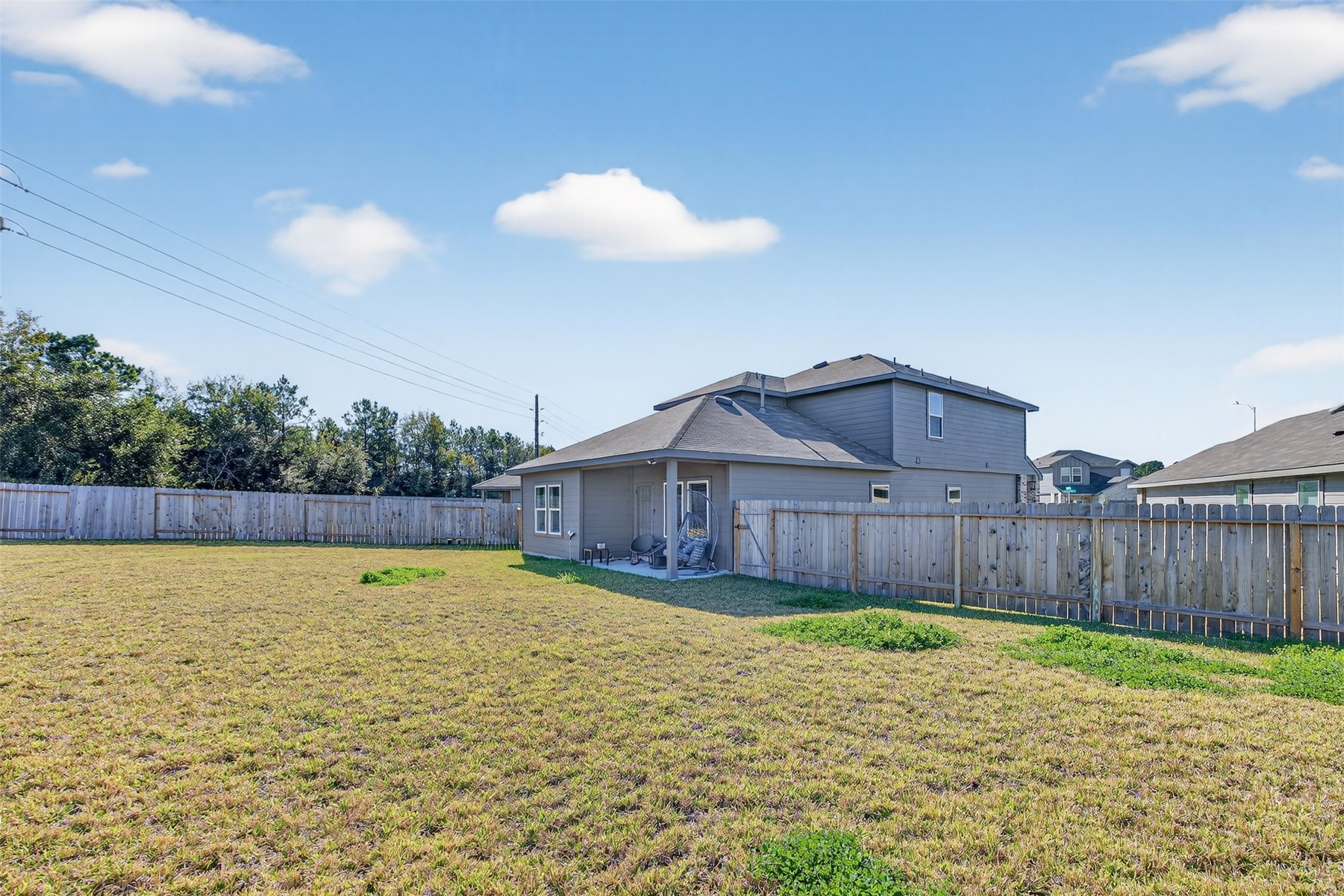1702 Legacy Hills Drive Houston, TX 77067 - Photo 38 of 43 a view of a house with a swimming pool