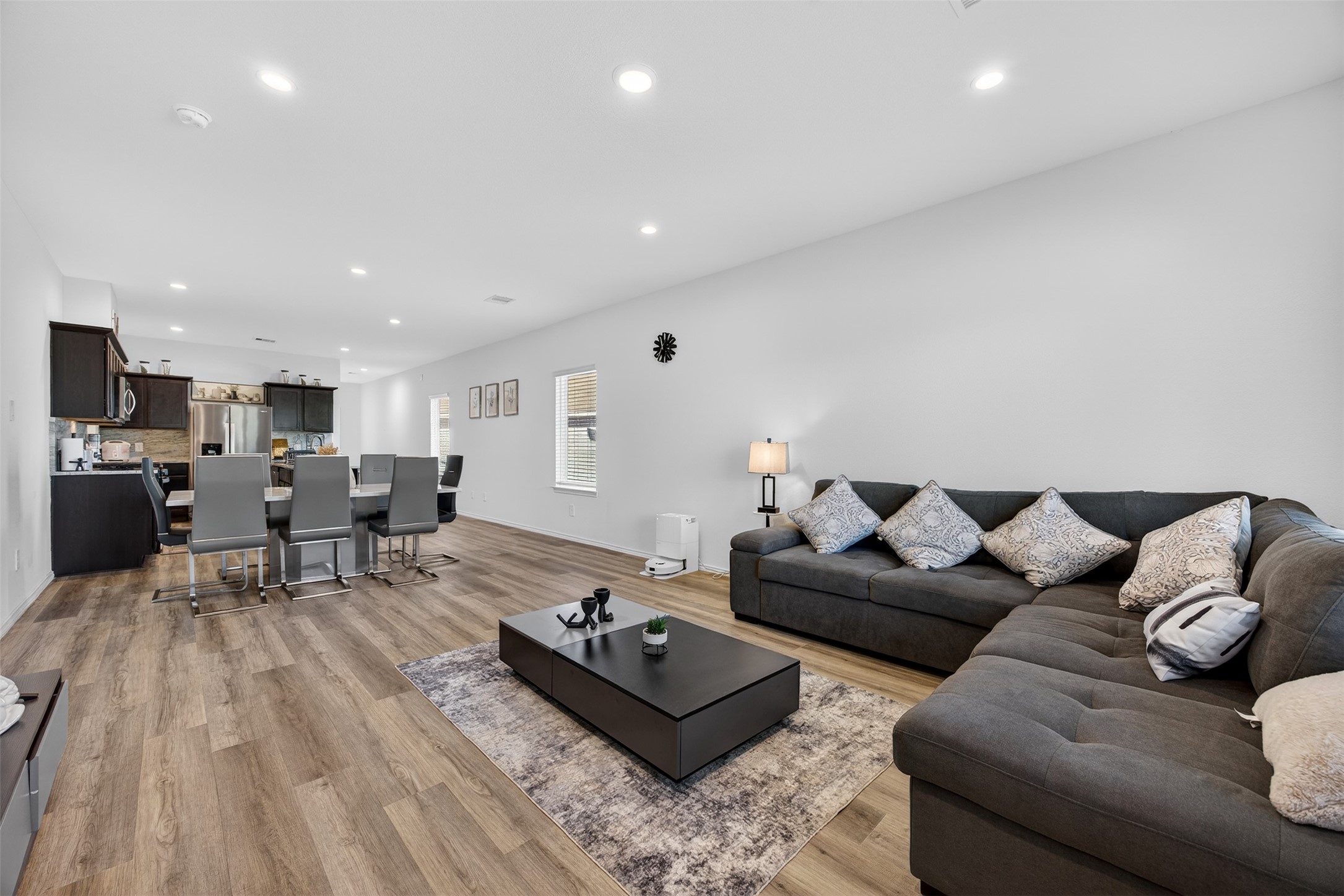 1702 Legacy Hills Drive Houston, TX 77067 - Photo 9 of 43 a living room with furniture and a table