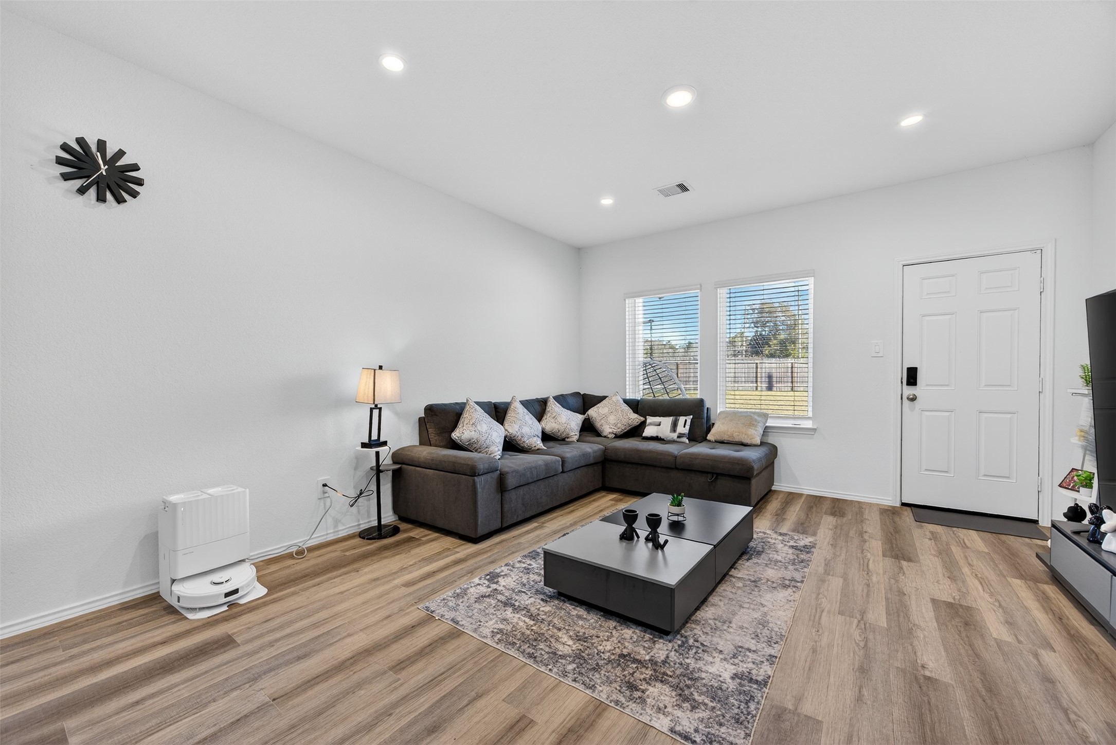 1702 Legacy Hills Drive Houston, TX 77067 - Photo 10 of 43 a living room with furniture and wooden floor