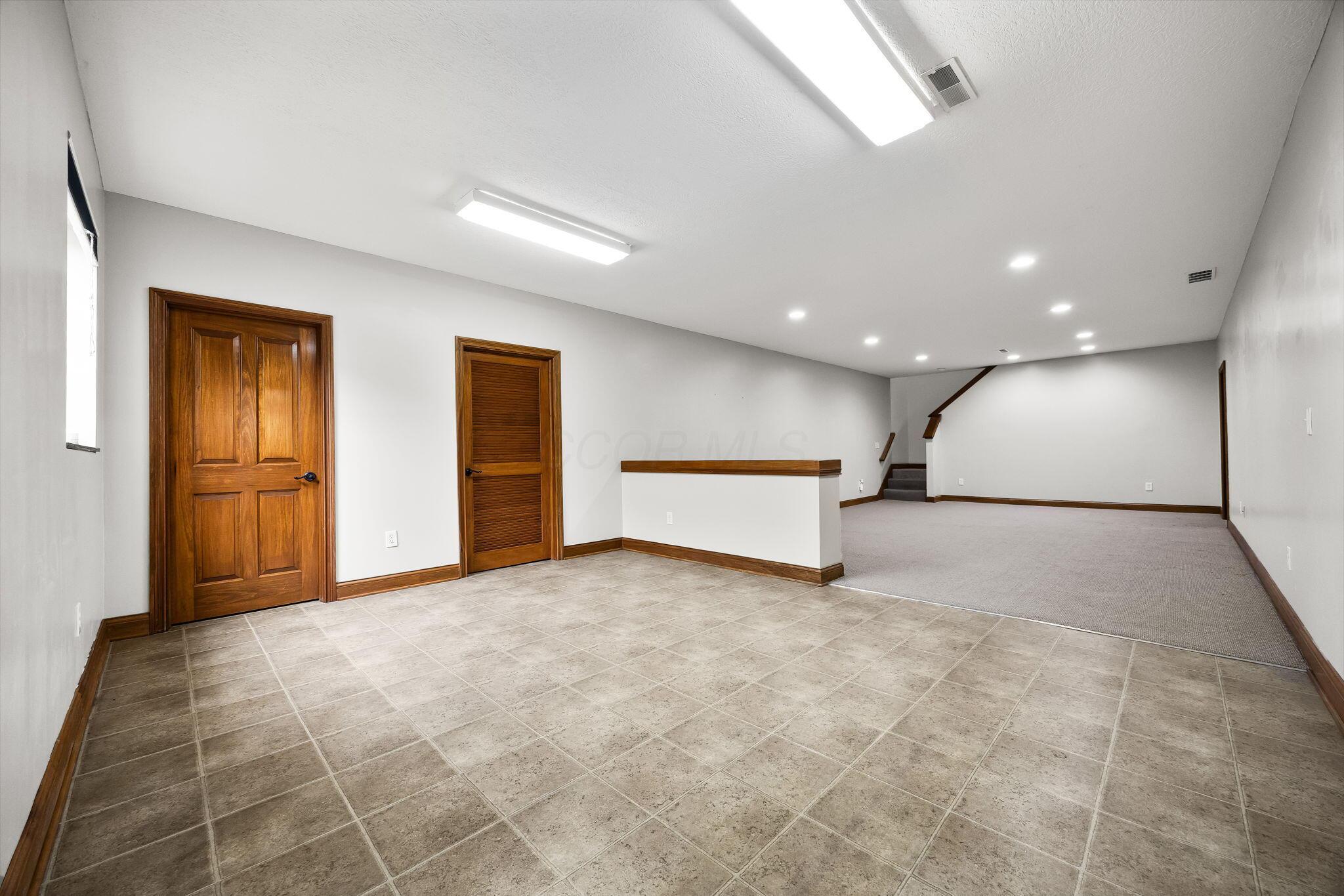 8312 Steitz Road Powell, OH 43065 - Photo 53 of 78 finished basement with egress window