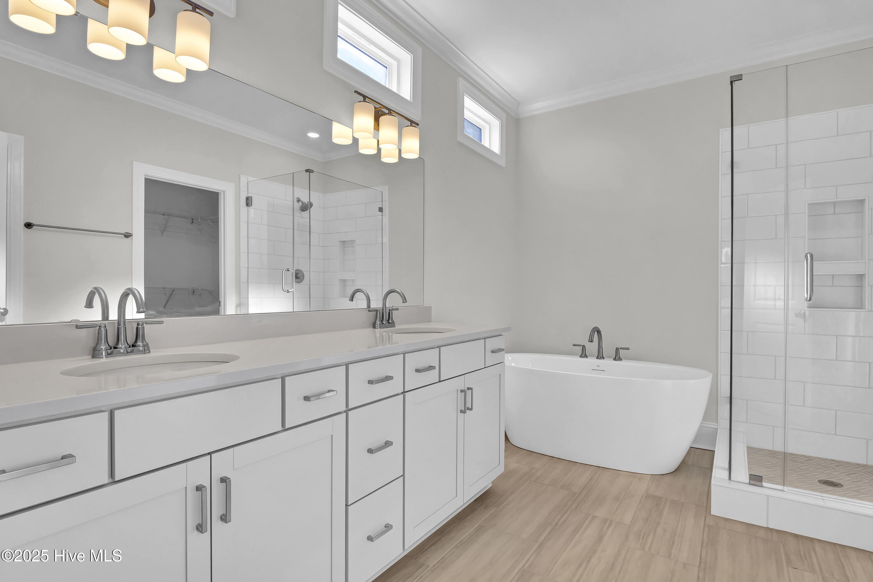 131 Planters Walk Hampstead, NC 28443 - Photo 17 of 36 First Primary Suite Bathroom 1