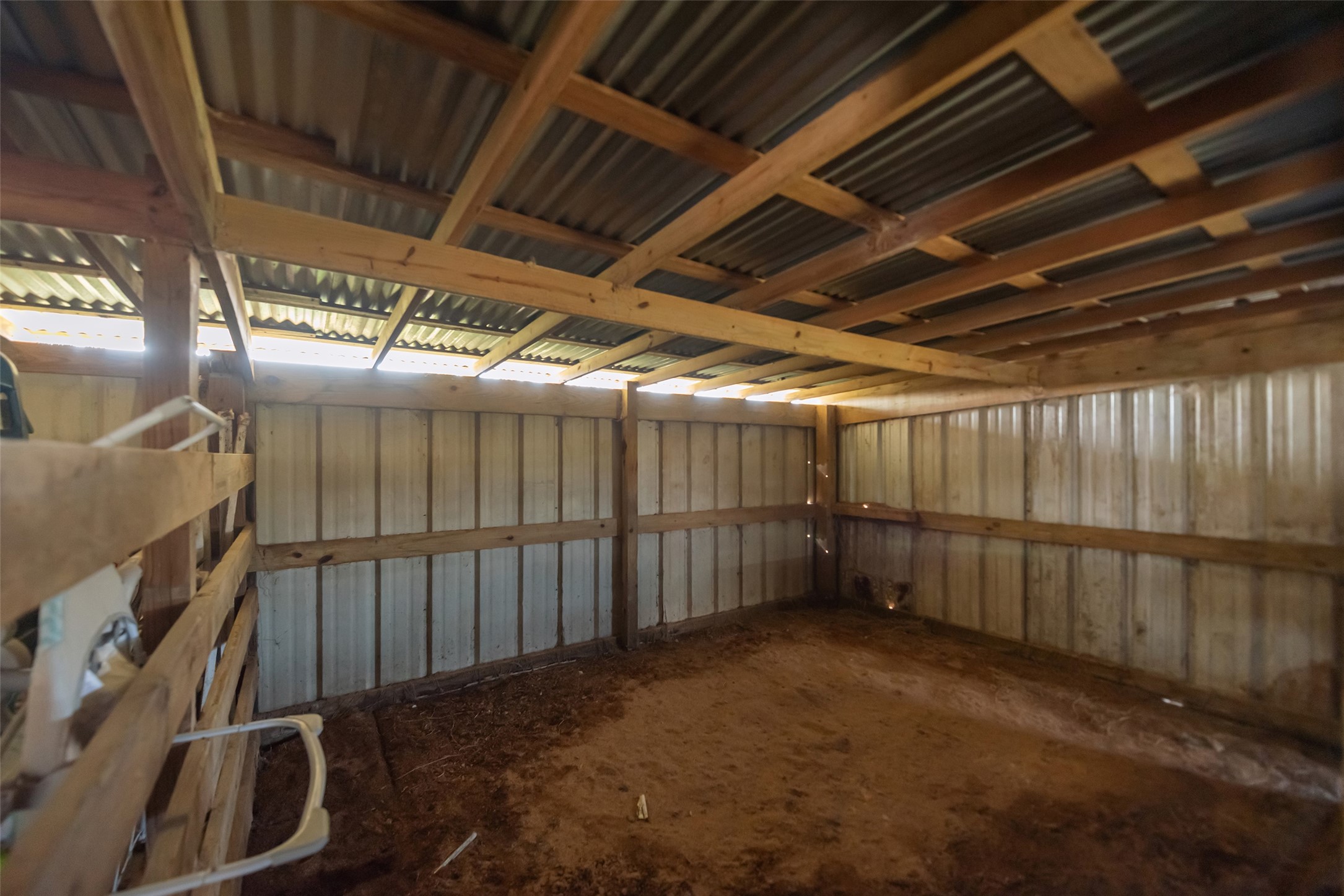 1014 Ginger Street Santa Fe, TX 77517 - Photo 43 of 50 a view of an empty room with wooden walls