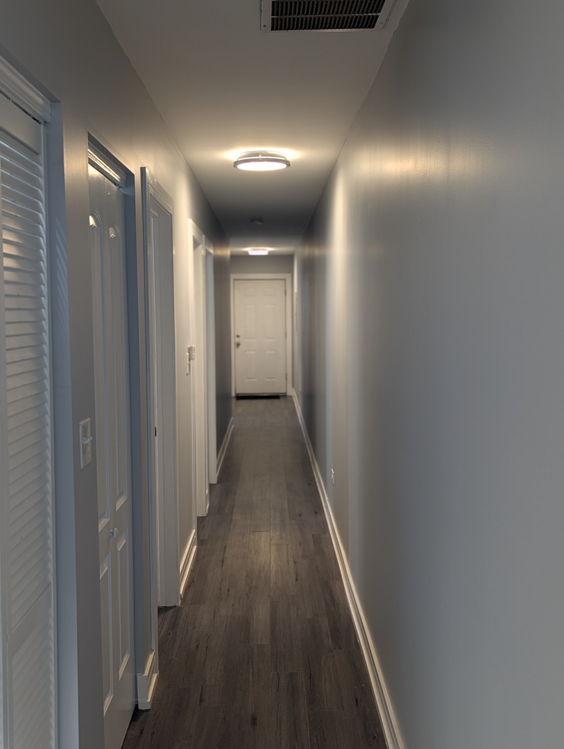 3925 South Indiana Avenue, Unit 3 Chicago, IL 60653 - Photo 2 of 11 a view of hallway with wooden floor