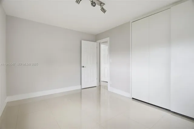 a view of a backyard with a garden and plants