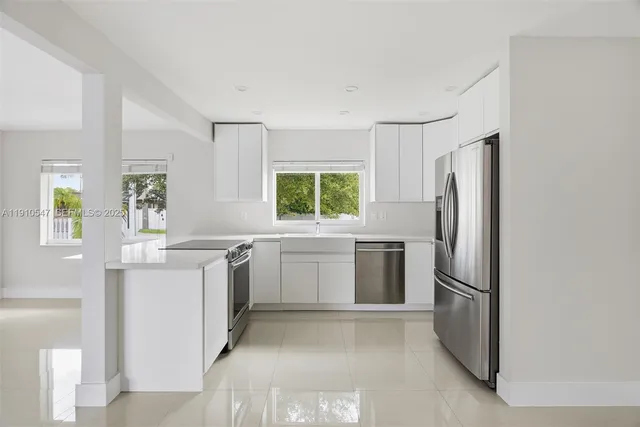 a view of a kitchen with a window