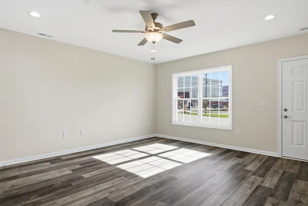 a view of kitchen with wooden floor